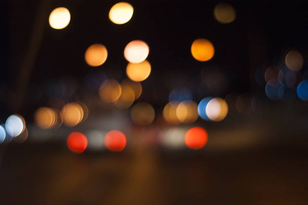 Defocused cars in the traffic at night. - Fotó, kép