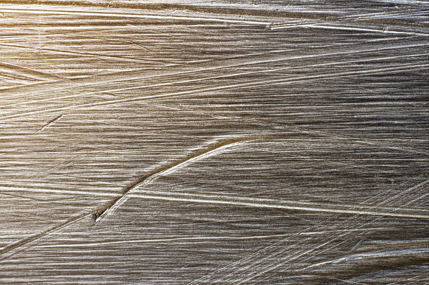 scratches on the sliding surface of the snowboard close-up - Photo, Image