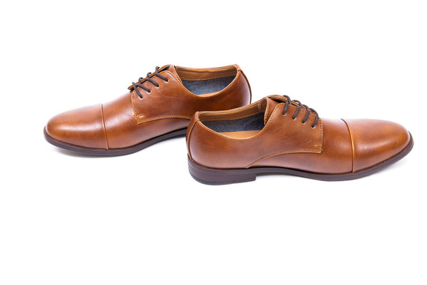 Chaussures brunes isolées sur fond blanc - Photo, image