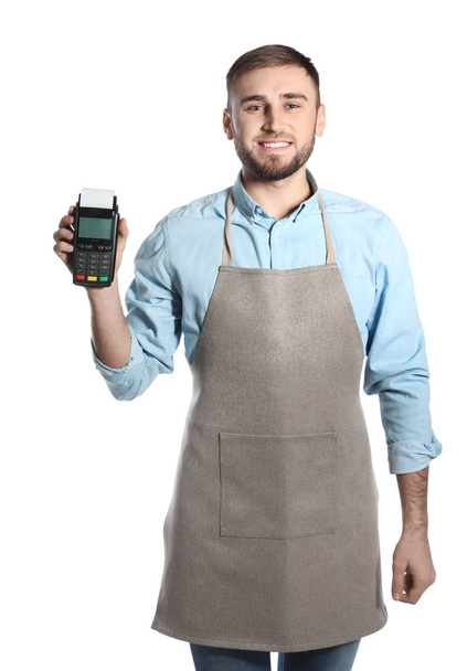 Young seller holding payment terminal isolated on white - Photo, image