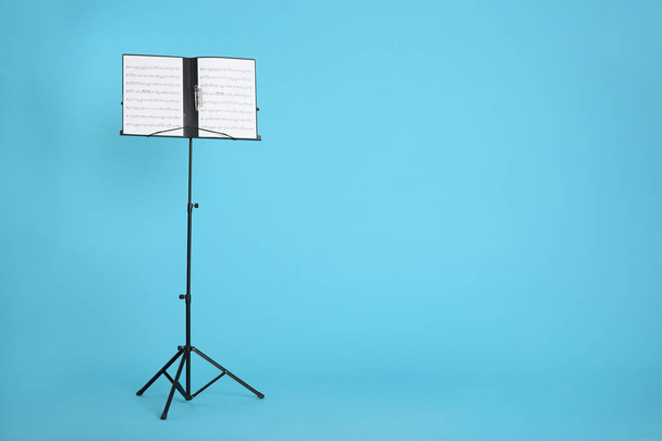 Note stand with music sheets indoors. Space for text - Photo, Image