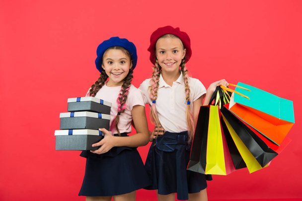 Birthday present. Shopping and holidays. For my dear friend. Girl giving gift box to friend. Girls friends celebrate holiday. Children formal wear with gift box. Open gift now. Friendship concept. - Фото, зображення