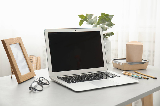 Cozy blogger workplace with laptop at home - Φωτογραφία, εικόνα