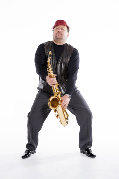 saxofonista con cerdas
 - Foto, imagen