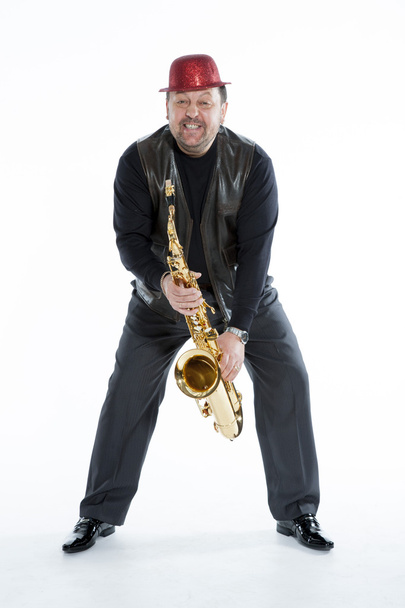 saxofonista com uma cerda
 - Foto, Imagem