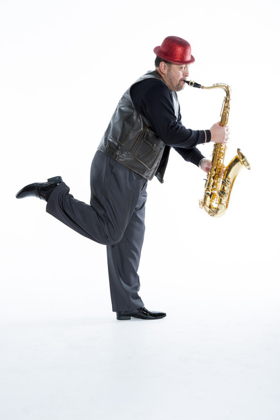 саксофоніст з щетиною
 - Фото, зображення