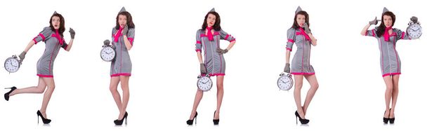 Giovane hostess con sveglia nel concetto di gestione del tempo
 - Foto, immagini