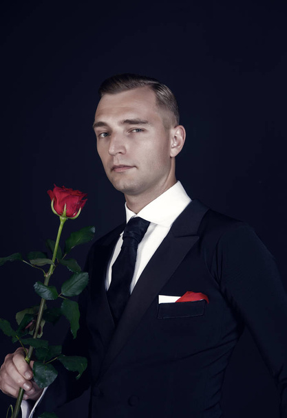 Ballroom dancer in suit with flower - Photo, image