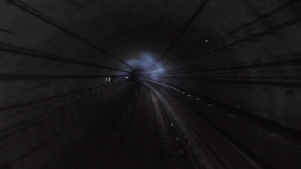 Subway train running through the tunnel. Train traveling through the underground tunnel, view from the cabin in 4K - Footage, Video