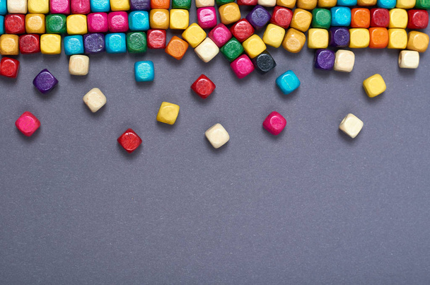 Wooden color beads composition. Needlework concept background. Flat lay and top view photo - 写真・画像