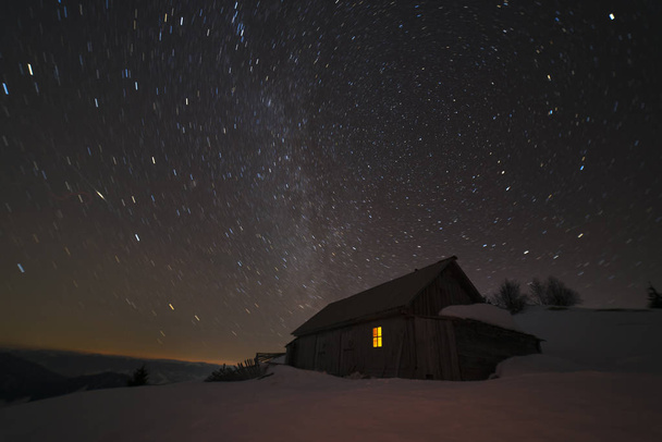 wooden house in winter forest snow mountain, - Fotografie, Obrázek