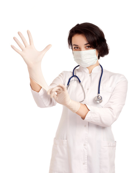 Doctor putting on gloves - Foto, Imagem