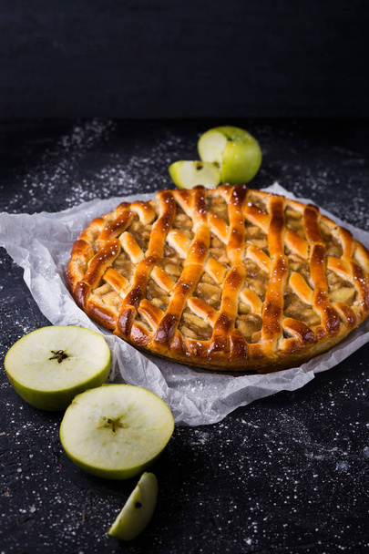 delicious pie with apples on black background - Photo, Image