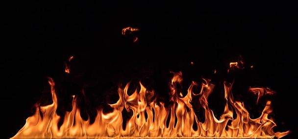 Texture of fire on a black background. - Foto, immagini