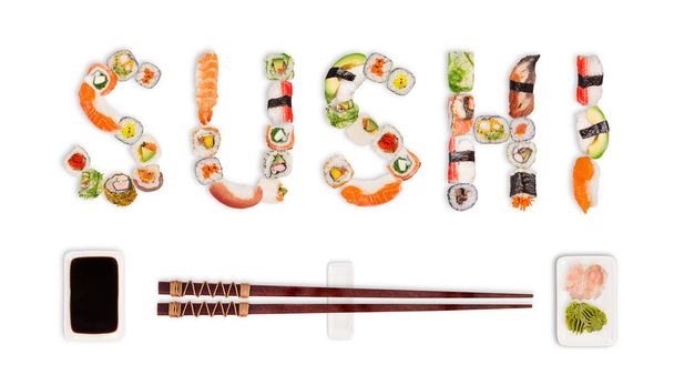 Traditional japanese sushi pieces making inscription. - Foto, Imagen