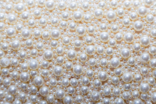 Pearl continuous background. Texture from beads of white pearls - Photo, Image