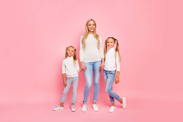 Full length size body portrait of nice cute attractive adorable charming lovely cheerful cheery people holding hands spending free spare time isolated over pink pastel background - Zdjęcie, obraz