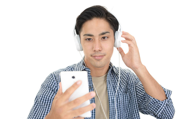 Man die naar muziek luistert - Foto, afbeelding