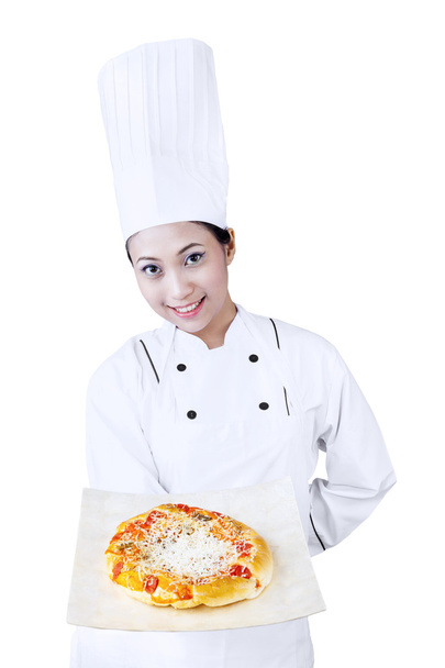 Chef shows pizza on white - Foto, afbeelding