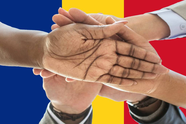 Romania flag, intergration of a multicultural group of young people - Photo, Image
