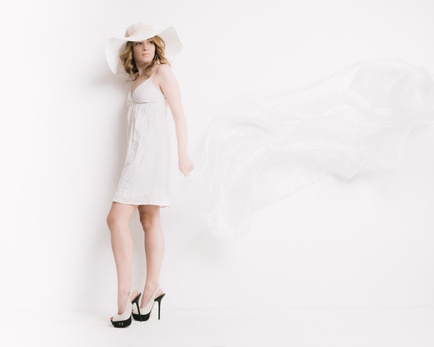 Blond woman in white - Photo, Image