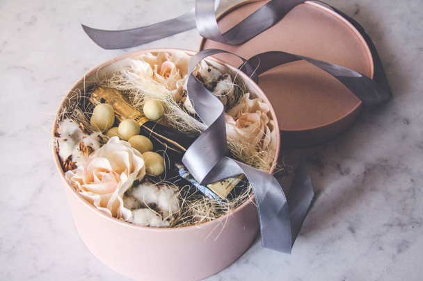 Valentine's day, white roses, chocolate, champagne, gray ribbon, roses in a box - Foto, Bild