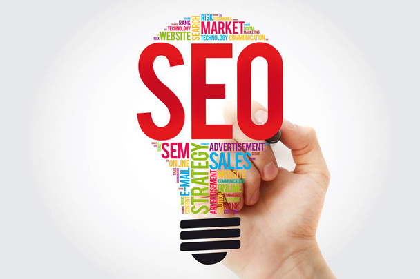 SEO (search engine optimization) bulb word cloud with marker, business concept - Photo, Image