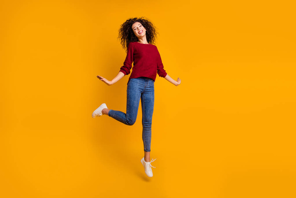Full length body size view of her she nice attractive cheerful cheery glad funny free slim thin fit wavy-haired lady good day daydream easy walk isolated on bright vivid shine orange background - Valokuva, kuva