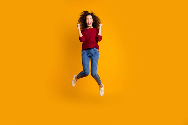 Full length body size view of her she nice crazy attractive cheerful cheery glad funny ecstatic slim thin fit wavy-haired lady satisfaction isolated on bright vivid shine orange background - 写真・画像
