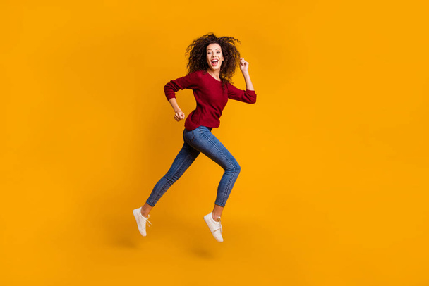 Full length body size view of her she nice pretty attractive cheerful cheery sportive slim thin fit wavy-haired lady running rush hour isolated on bright vivid shine orange background - Foto, Imagem