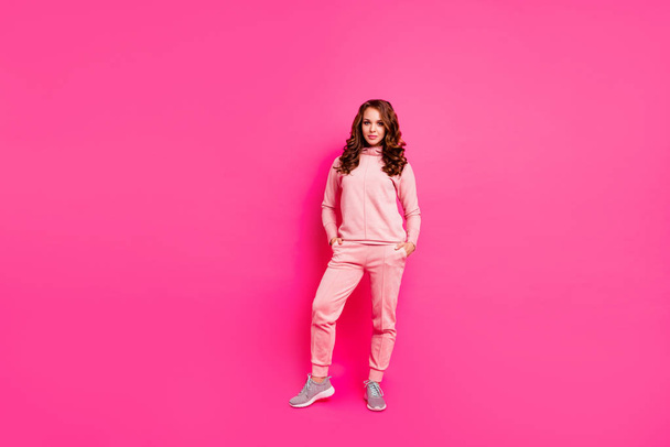 Full length body size photo amazing beautiful she her lady hands arms in pockets self-confident wearing modern casual pink costume suit pullover outfit isolated vibrant vivid rose background - Foto, afbeelding