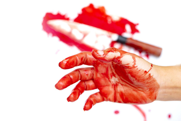 Hand bloody on white background, Social violence Halloween concep - Photo, Image