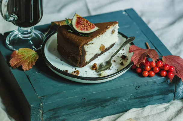 Breakfast in bed with with coffee and chocolate cheesecake - Zdjęcie, obraz