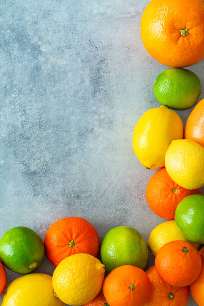 citrusové plody na kamenné pult - Fotografie, Obrázek