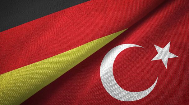 Germany and Turkey flags together relations textile cloth, fabric texture - Photo, Image