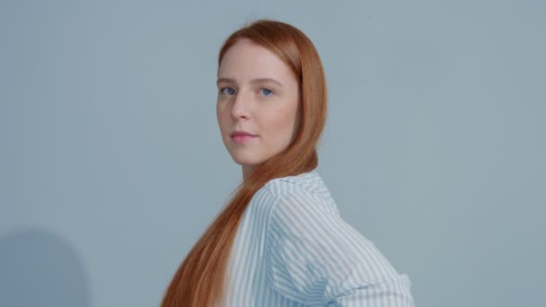 gingerhead red hair, ginger hair model with blue eyes on blue background - Imágenes, Vídeo