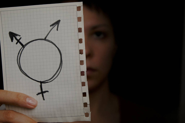 Transgender symbol on a black background close-up - Photo, Image