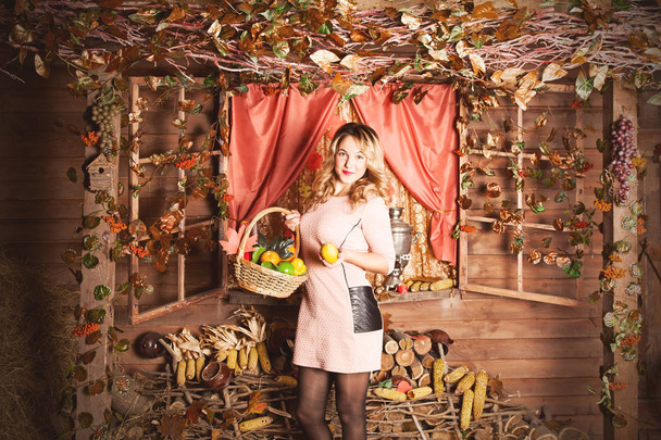 Beautiful blond on autumn background - Фото, изображение