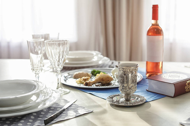 Table served for Passover (Pesach) Seder indoors - Fotoğraf, Görsel