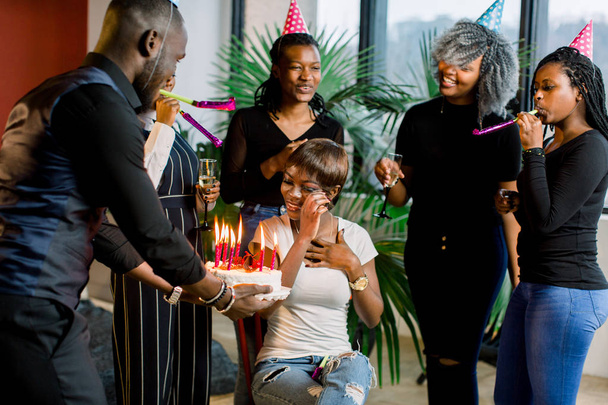 Group of happy young African people celebrating birthday and having fun together - Fotó, kép