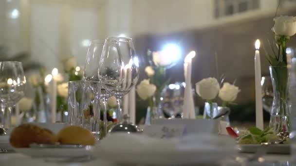 Decorated table on a gala dinner party or wedding celebration - Materiał filmowy, wideo