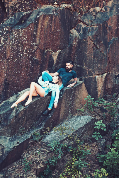 A little time to relax. Sensual couple on vacation trip. Sexy woman and bearded man on natural landscape. Couple enjoy love and romance. Couple in love on summer vacation - Photo, Image