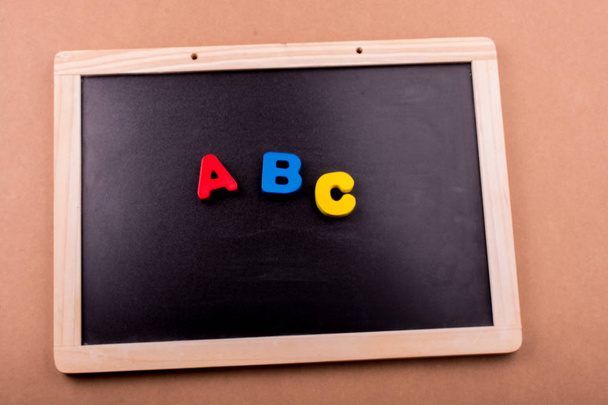 Színes ABC betűk ábécé fából - Fotó, kép