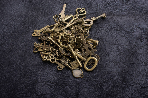 Retro style metal keys on a black background - Photo, Image
