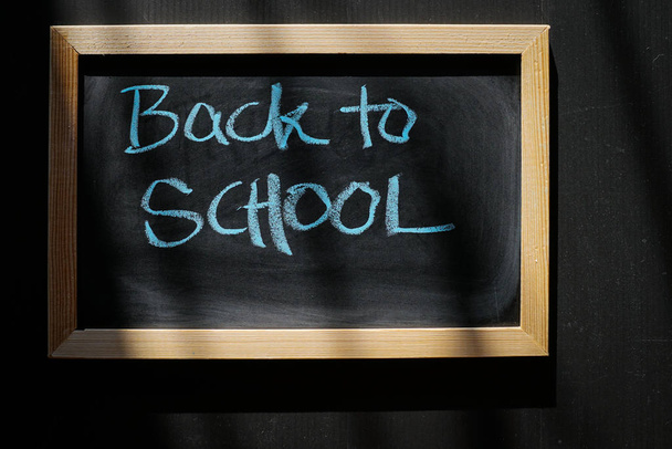 Back to school hand written with chalk on a blackboard - Foto, Imagen