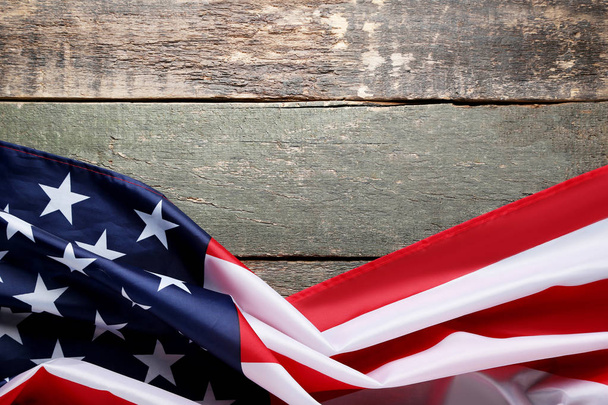 American flag on grey wooden table - Фото, изображение