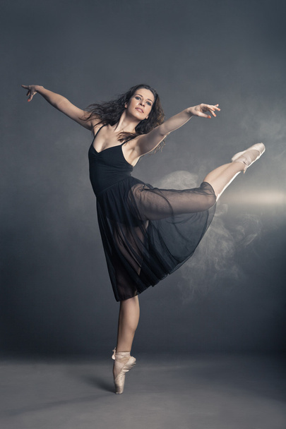 Modern style dancer posing on grey background - Foto, Imagen