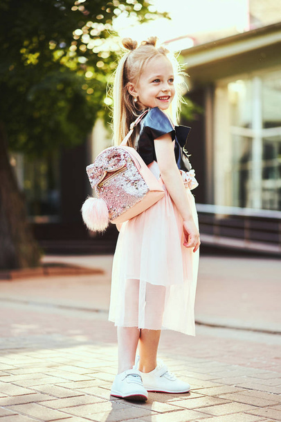 Adorable toddler girl wearing pink dress. Fashion portrait - Photo, Image