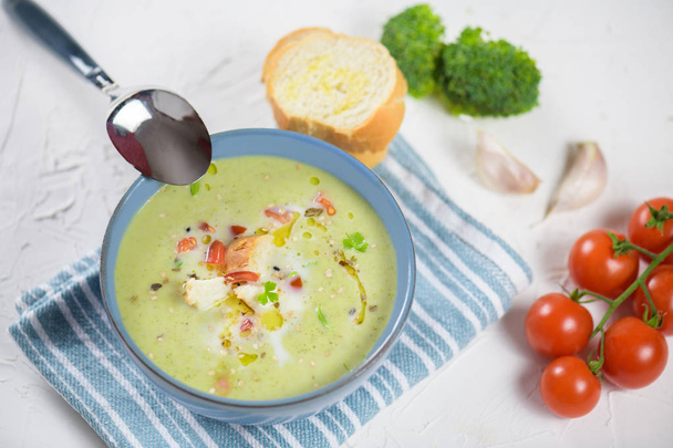 bowl of broccoli cream soup, croutons with olive oil, vegetarian soup - Photo, Image