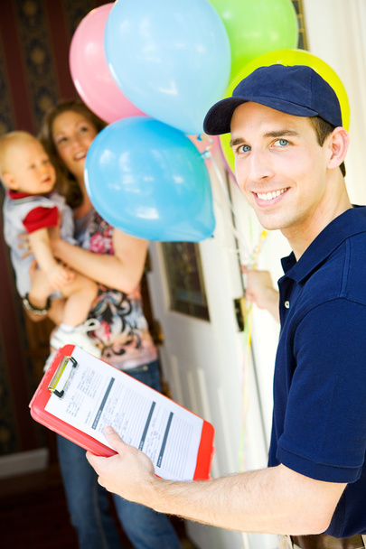 Delivery: Deliveryman with Balloon Bouquet - Photo, image